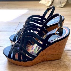 Black strapped wedge heels. Steve Madden.